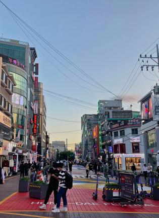 a Seoul city street near sunset