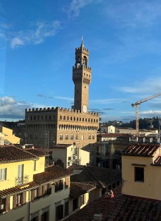 Ariel view of architecture in Florence, Italy against a blue skye