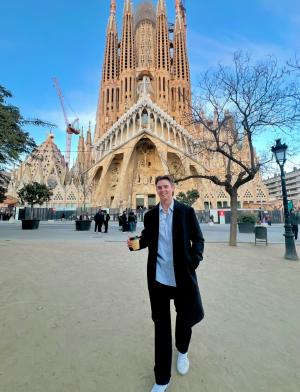 IES Abroad Barcelona intern on his way to work past La Sagrada Familia