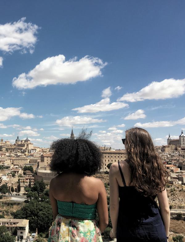 Two students view Toledo city from afar