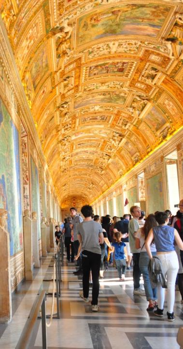 tourists visiting an art museum in Rome