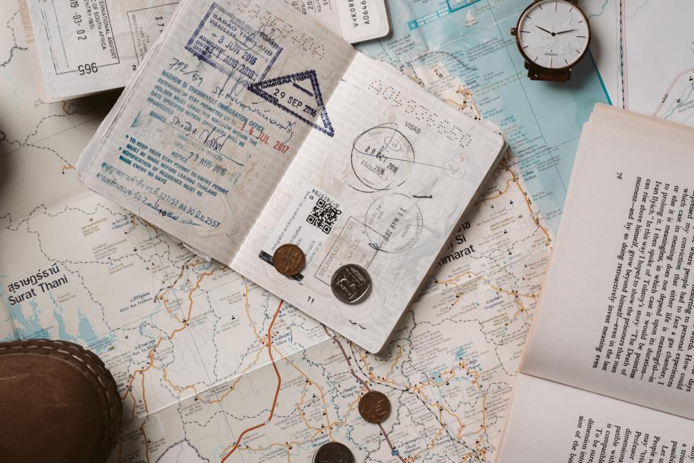 passport stamps and stickers inside of passport books