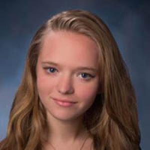 Group standing on a sandy beach with ocean in the background. 

Melted clock draped over table edge, inspired by Dali. 

Portrait of a person with long hair, neutral expression. This alt text was added with Al; accuracy may vary.
