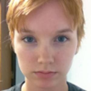 Smiling woman with brown hair; Woman with glasses smiling; Serious woman with short hair. This alt text was added with Al; accuracy may vary.