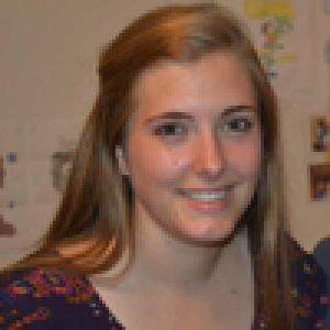 Smiling people in profile pictures with neutral backgrounds. This alt text was added with Al; accuracy may vary.