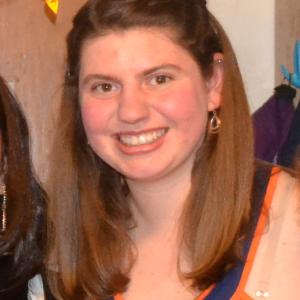 Smiling people in casual settings, each facing the camera. This alt text was added with Al; accuracy may vary.