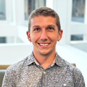 A headshot photo of Garrett