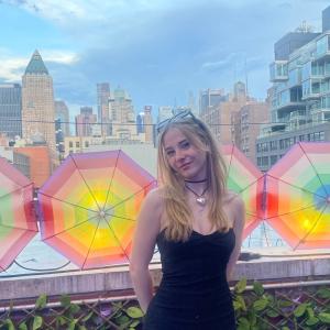 Hartley smiling at the camera