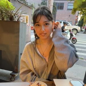 Maya smiling at camera