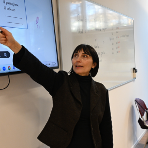 IES Abroad professor teaching in a classroom.