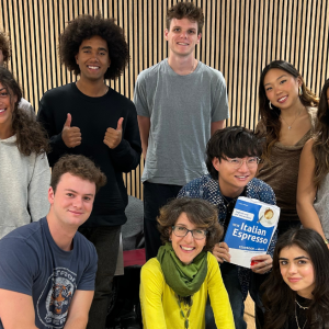 Group of IES Abroad students and professor in a classroom.