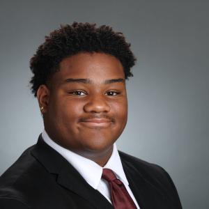 Elijah Goss smiling headshot