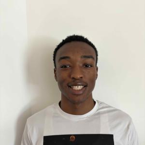 James Wright smiling headshot