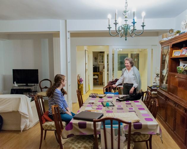 A student and their host mother gathering at the dinner table in a Madrid Homestay.