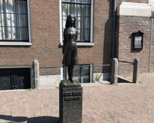 a monument of anne frank near anne frank house 