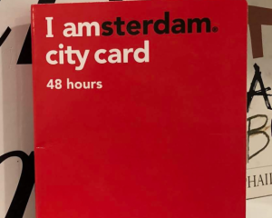 a red city card saying "I amsterdam city card 48 hours 2018"