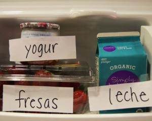 a picture of products inside of the fridge with translation notes on them 