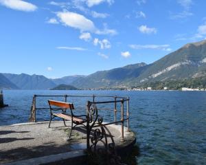 A bench overlooks Lake Como.