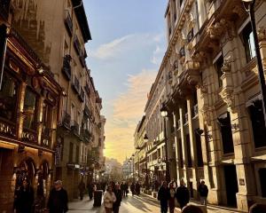 Sunset in between buildings in Madrid