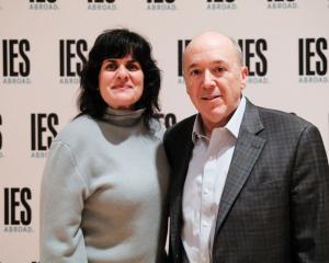 A woman and man standing side-by-side.