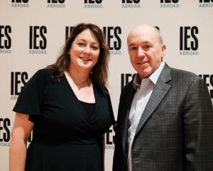 A woman and man standing side-by-side.