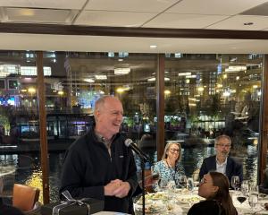 A man talking at a mic
