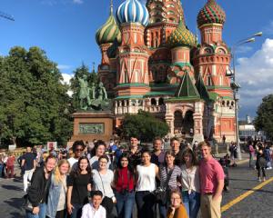students during a group photo in Moscow near the Kremlin 