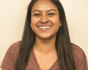 Raisa Hasque smiling.