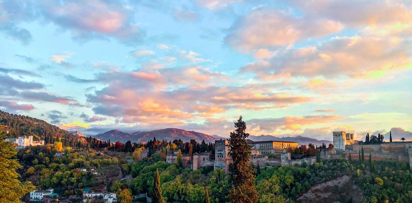 Granada hilltops and skies before sunset
