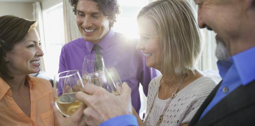 Mature adults toasting