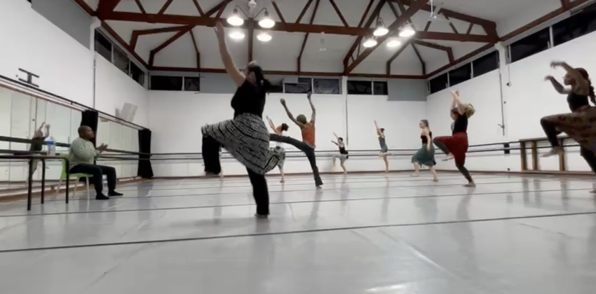 Image in dance studio of students dancing. 