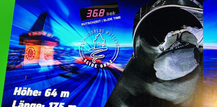 An image of the author sliding down the slide in Graz, with a time of 36.8 seconds. They are lying down and their face is obscured.