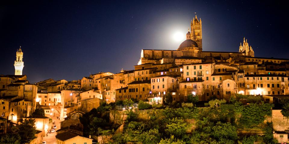 Siena under the stars at night