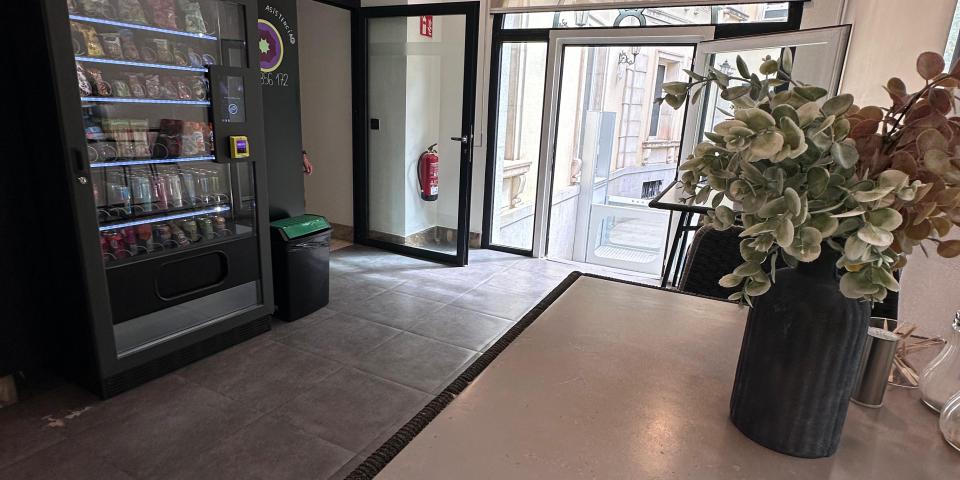 An ornate entryway with vending machines