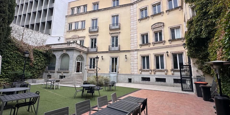An outdoor patio with tables