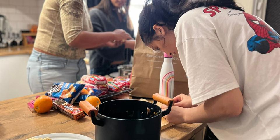 People making food in the kitchen 