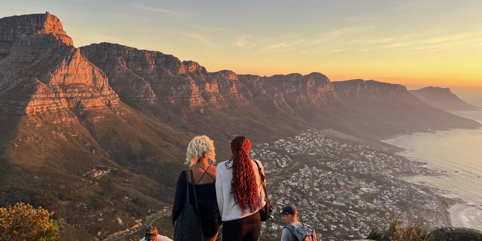 Image of the sunset on the top of Lions Head looking to the twelve apostles mountain range. 