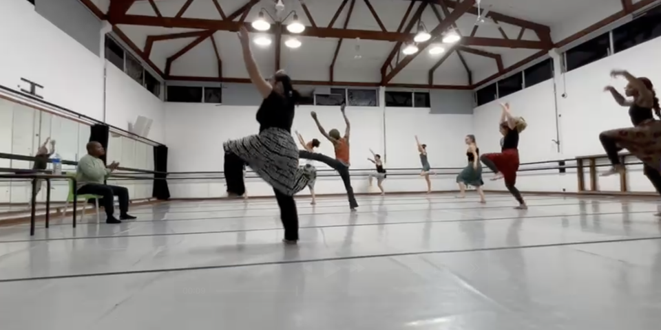 Image in dance studio of students dancing. 